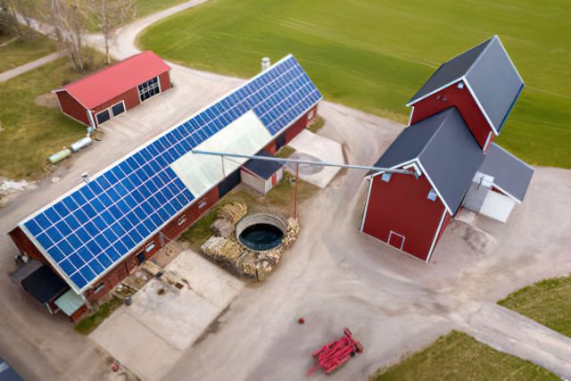 Solar panel drone inspection above a farm